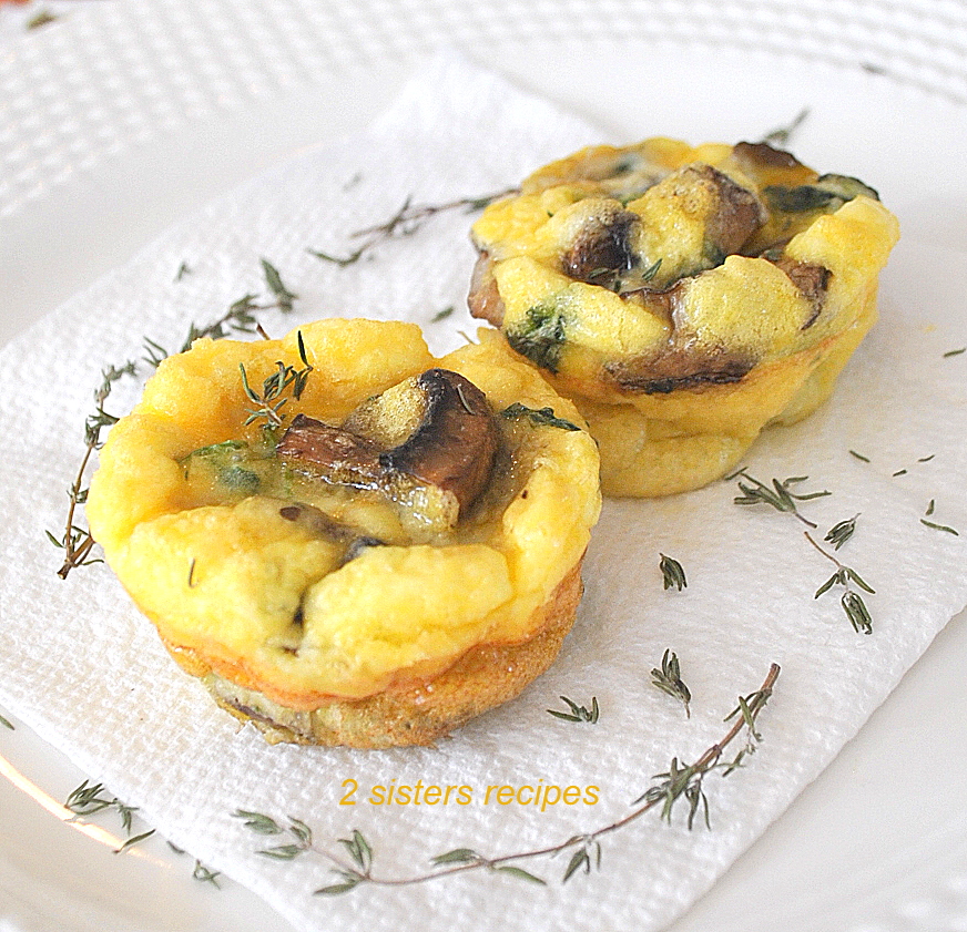 two little frittatas on a white napkin. by 2sistersrecipes.com