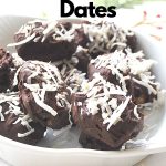 Chocolate Covered Dates are coated with shredded coconut and served in a white bowl.