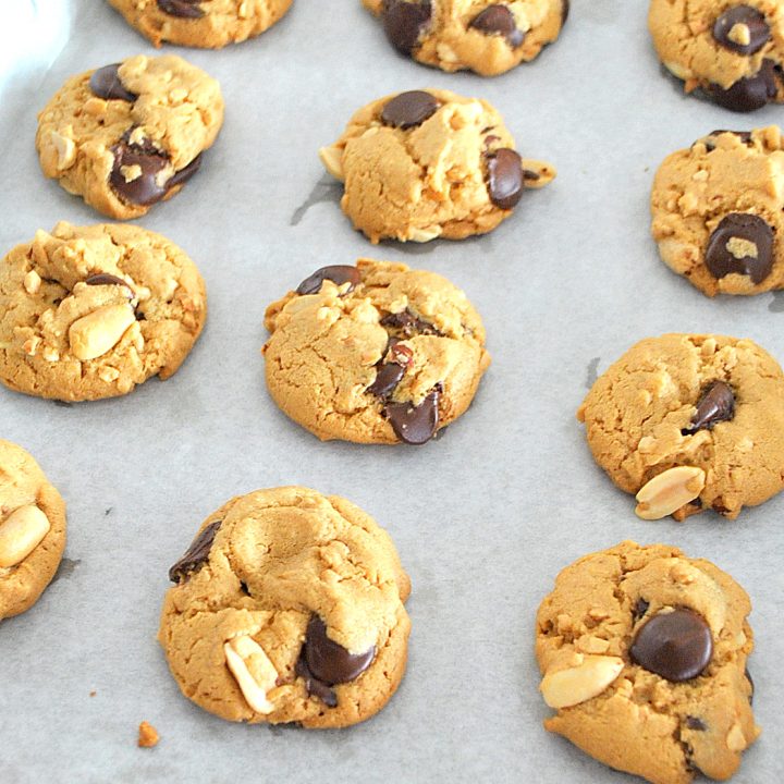A cookie sheet with baked cookies on it. by 2sistersrecipes.com