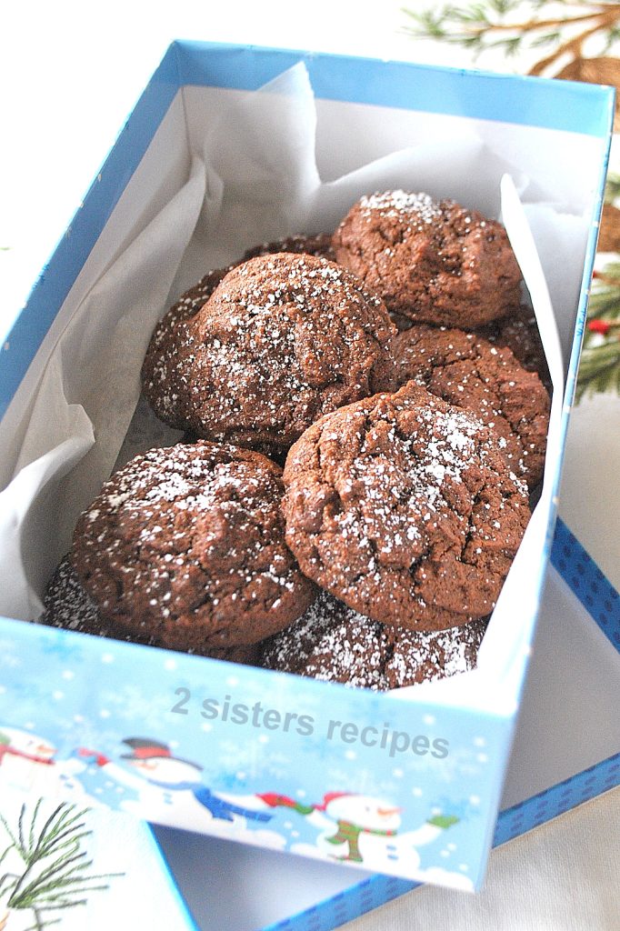 A holiday gilt box with chocolate cookies inside. by 2sistersrecipes.com