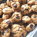 A silver tray filled with Peanut butter cookies. by 2sistersrecipes.com
