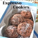 A holiday box filled with baked double chocolate cookies.