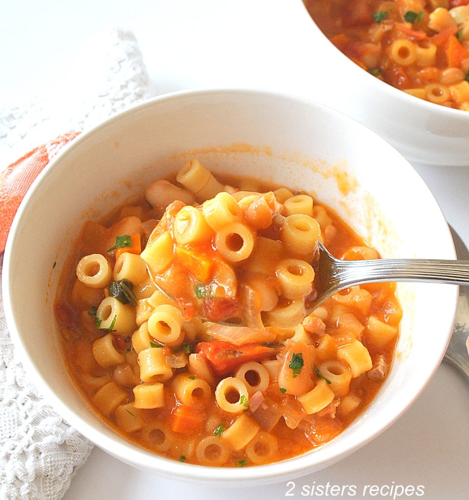 A spoonful of pasta and beans soup. by 2sistersrecipes.com