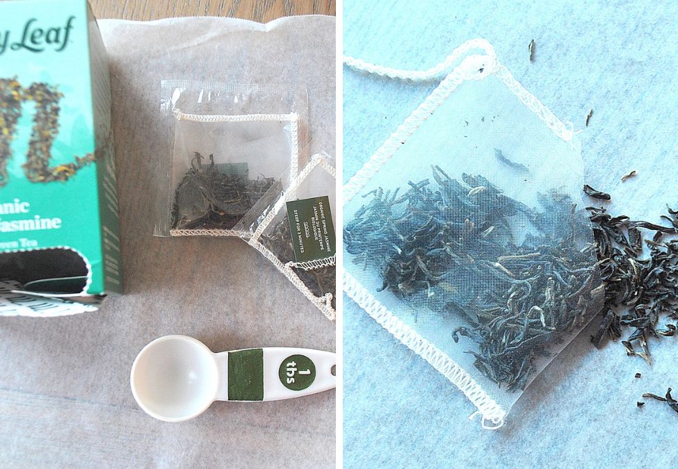Jasmine Tea bag opened with loose tea leaves on the table. by 2sistersrecipes.com