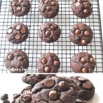 Chocolate brownie cookies are cooling on a wire rack.