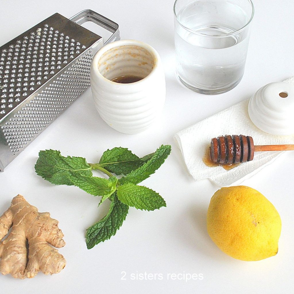 photo of ingredients for the lemon, ginger,honey water. by 2sistersrecipes.com
