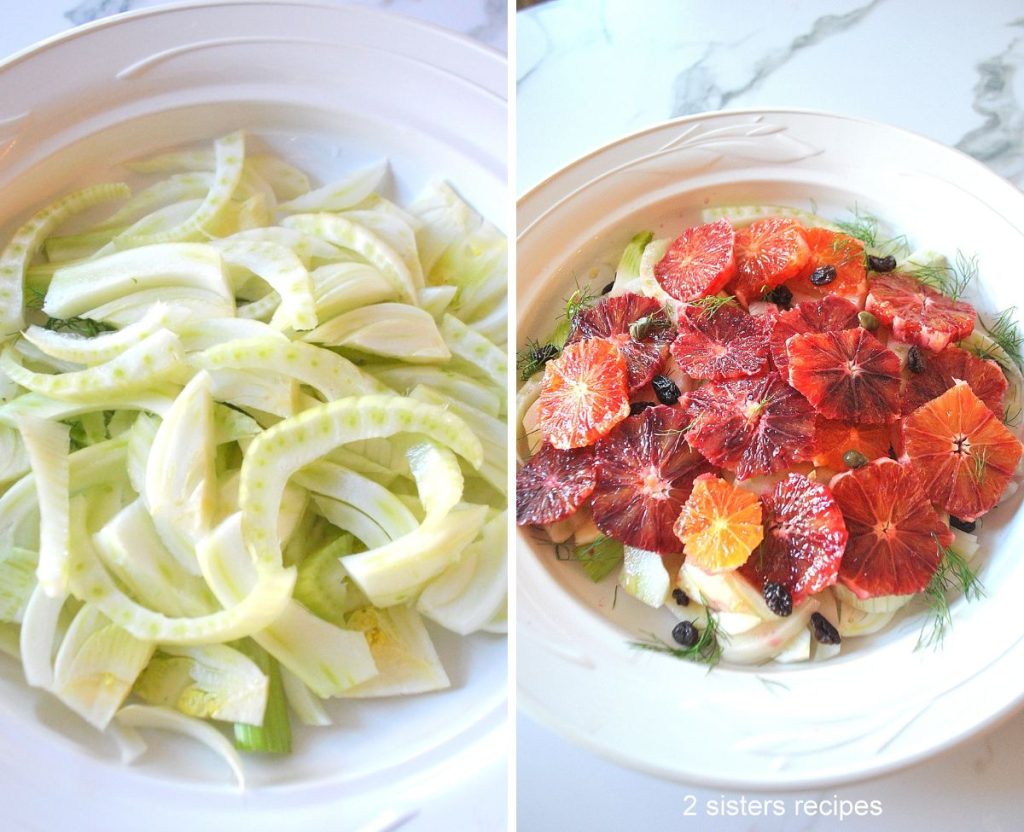 Sliced fennel in a white round salad bowl, and sliced blood oranges on top.