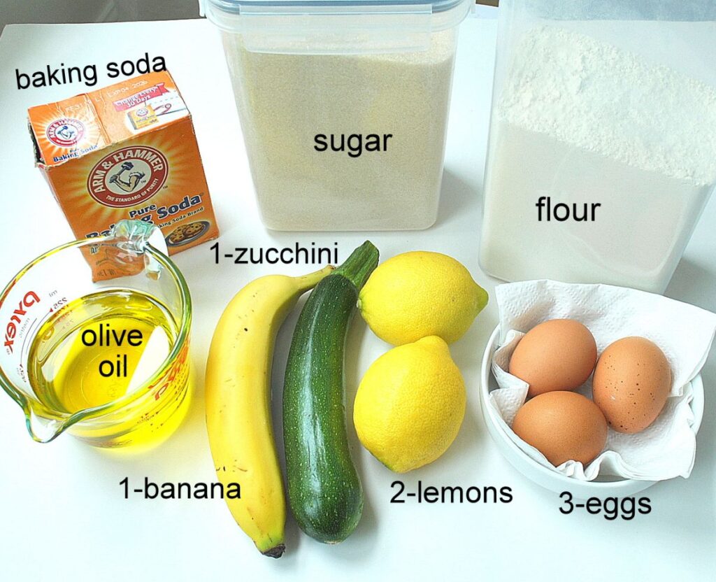 Ingredients are displayed on the table for our lemon zucchini olive oil bread.