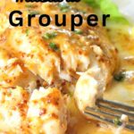 A forkful of baked grouper with a honey mustard glaze on top.