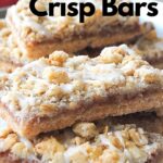 Apple crisp bars are piled on top of one another.