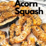 A white platter filled with baked parmesan-crusted acorn squash as a side dish.