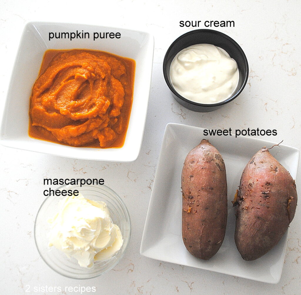 Four ingredients, sour cream in a black bowl, pumpkin puree in square bowl, 2 sweet potatoes and a small bowl with mascarpone cheese.