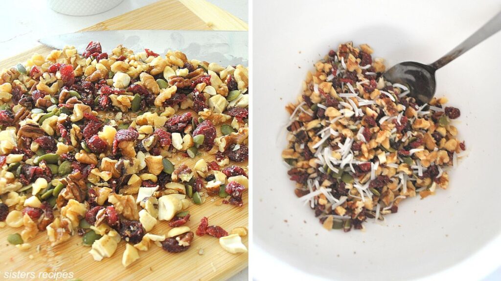 A cutting board with chopped fruit & nuts, and a white bowl with the mixture.