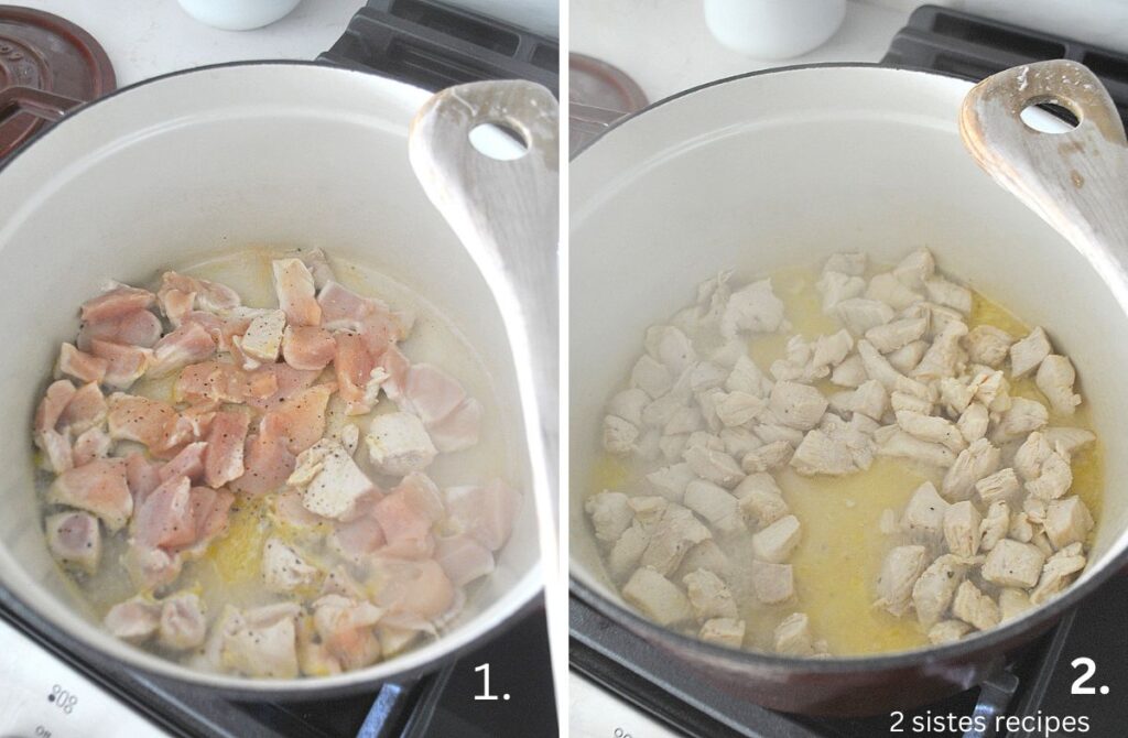 A Dutch oven pot on stove top cooking bite-szied chicken.