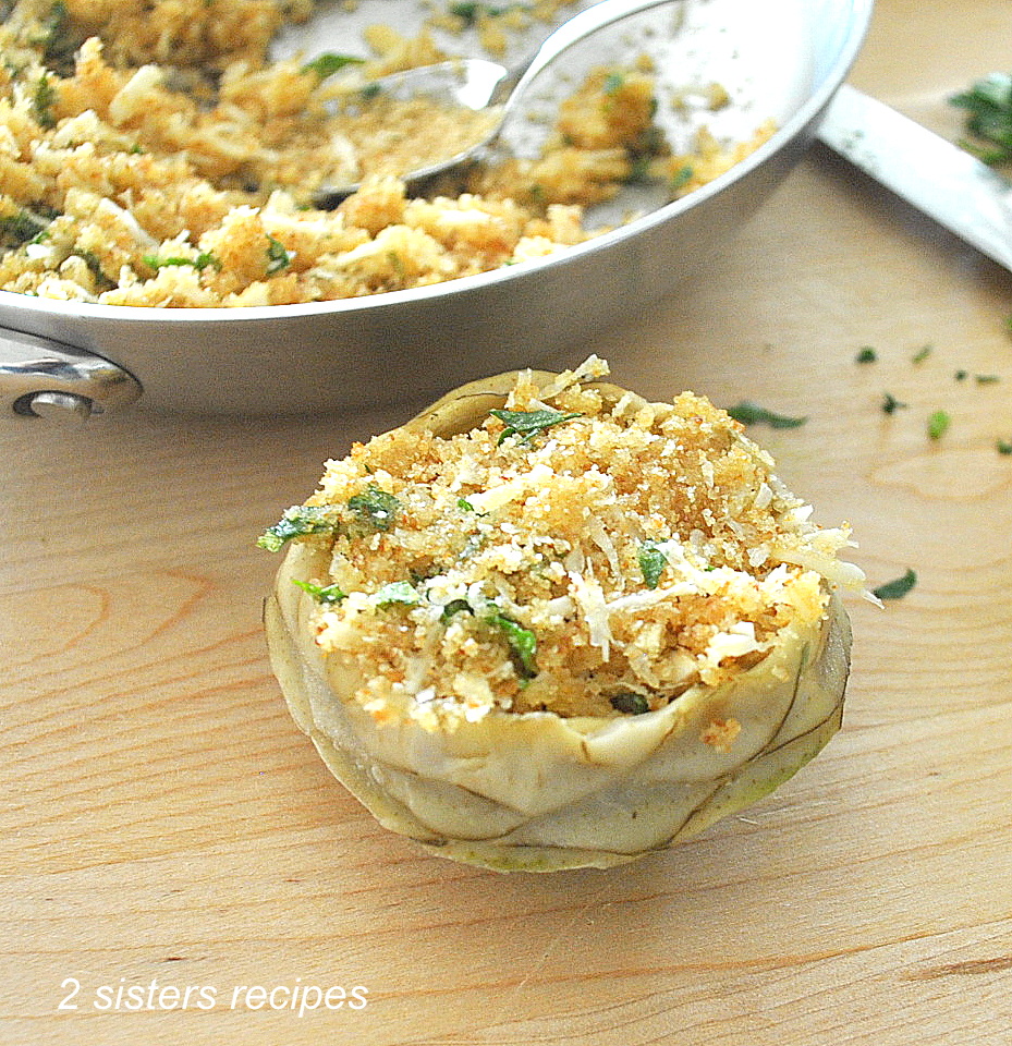 one artichoke bottom stuffed with a bread crumb and cheese mixture.