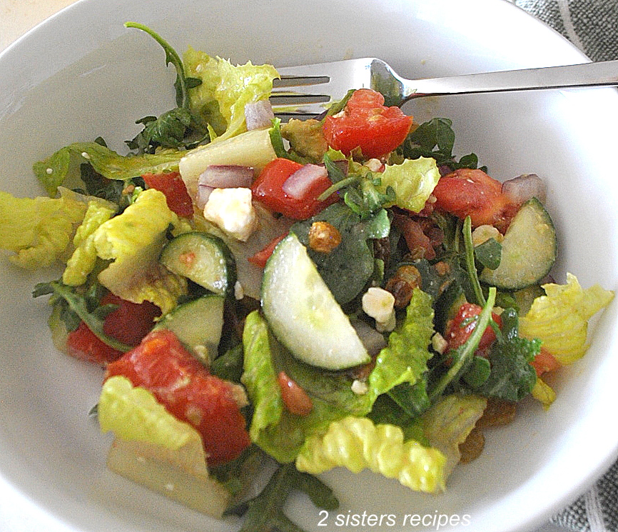 Best Fresh Italian Green Salad White plate with a mixed salad.