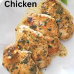 A white platter with herb mustard chicken served.