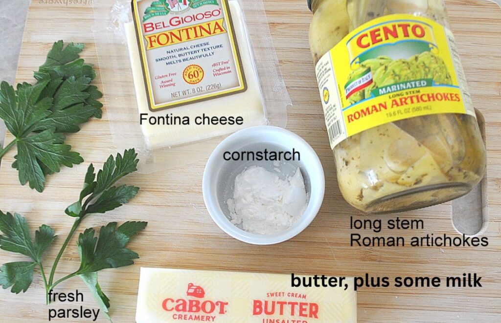 A package of Fontina cheese, a jar of marinated artichokes, a stick of butter and fresh parsley and cornstarch.