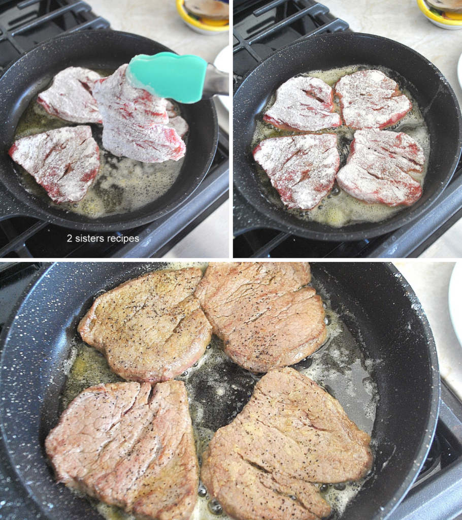 A black skillet with 4 thin steaks searing.